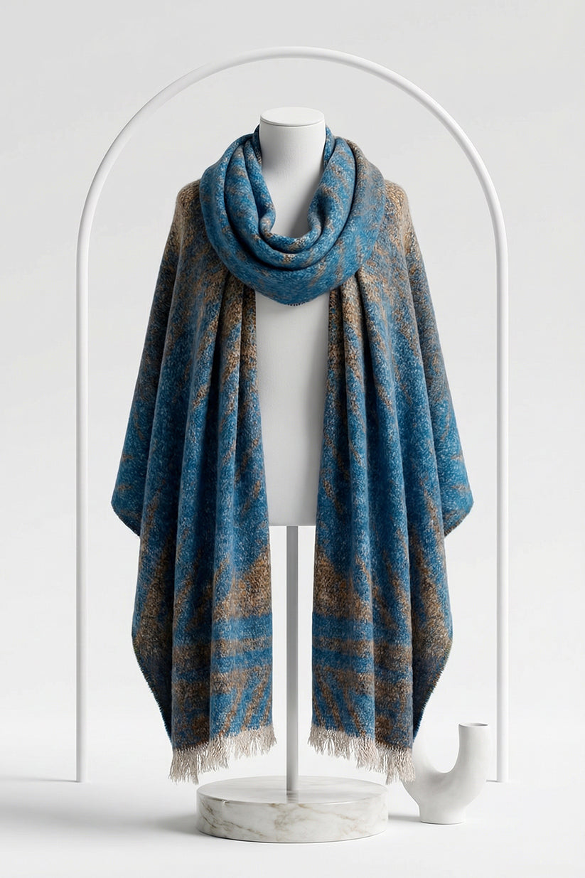 Blue and brown plaid scarf on a mannequin against a white background