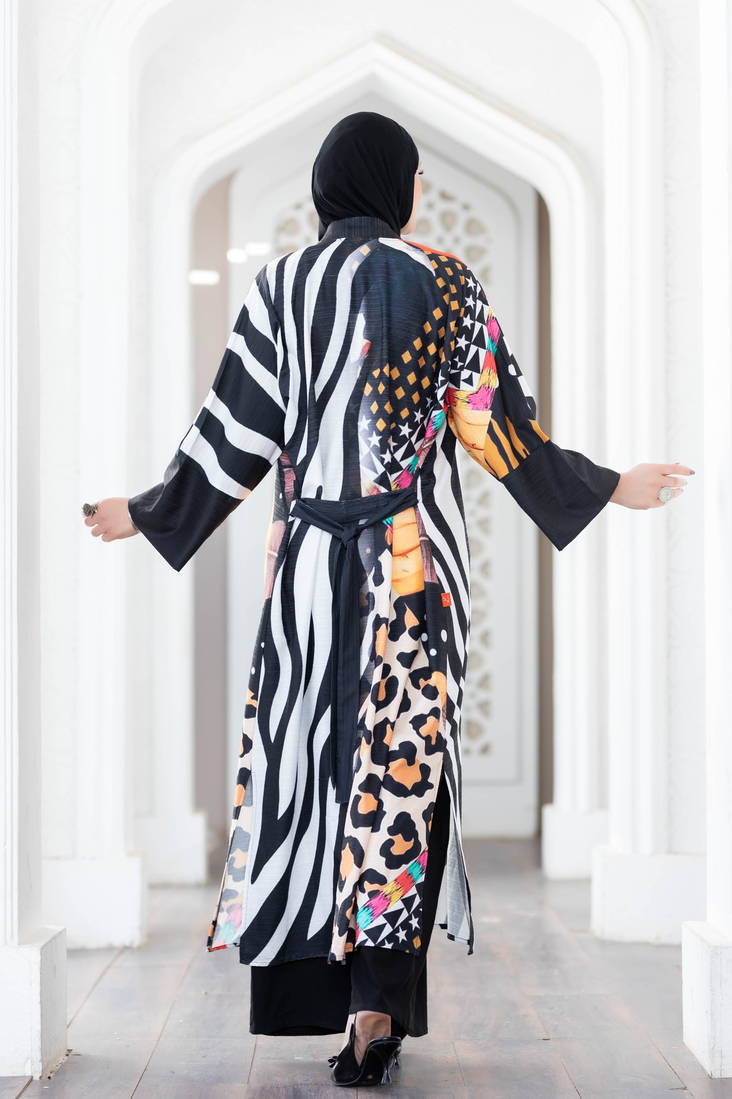 Vibrant digital print kimono with striking zebra stripes and leopard pattern details, ideal for a stylish, fashion-forward look.