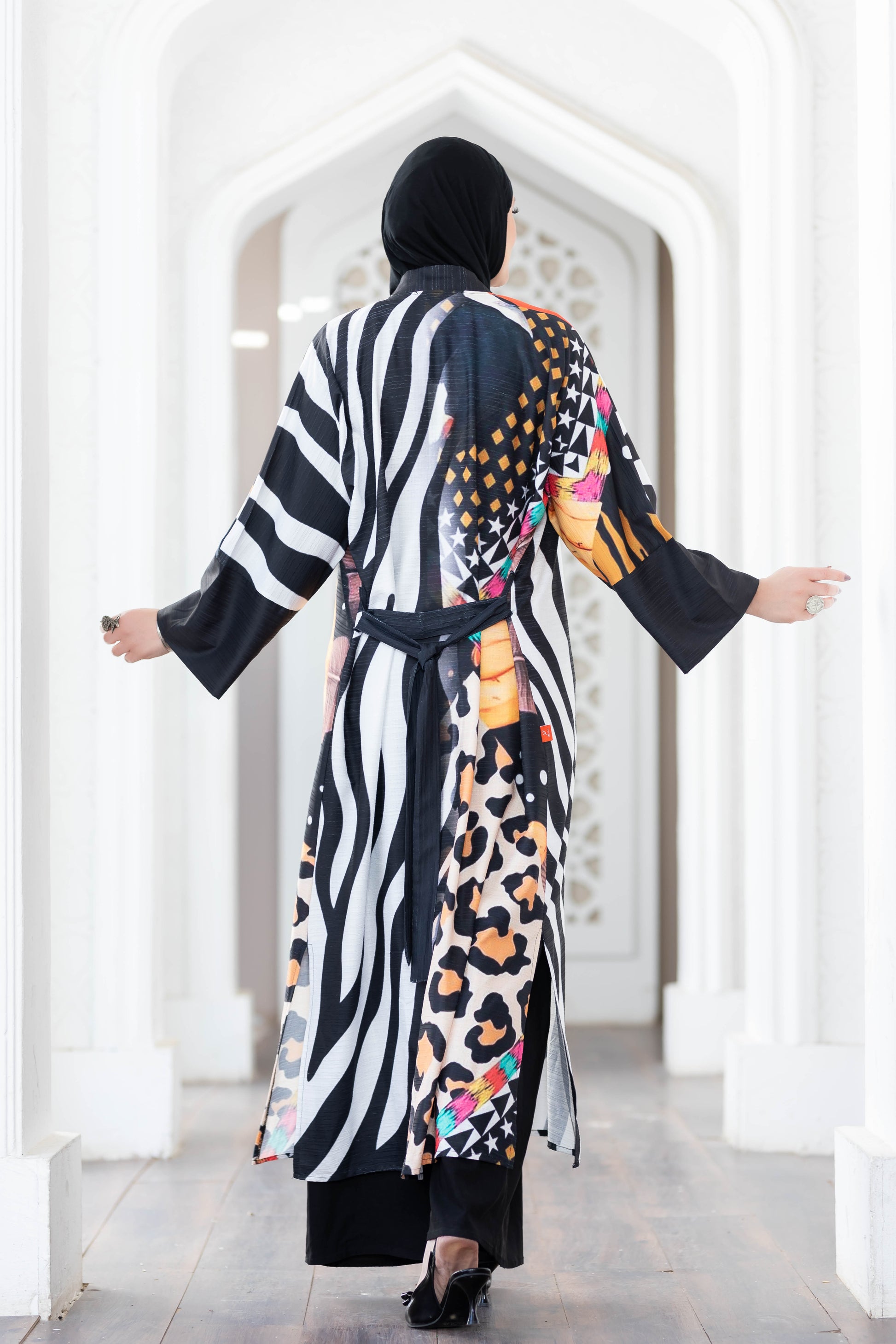 Vibrant digital print kimono with striking zebra stripes and leopard pattern details, ideal for a stylish, fashion-forward look.