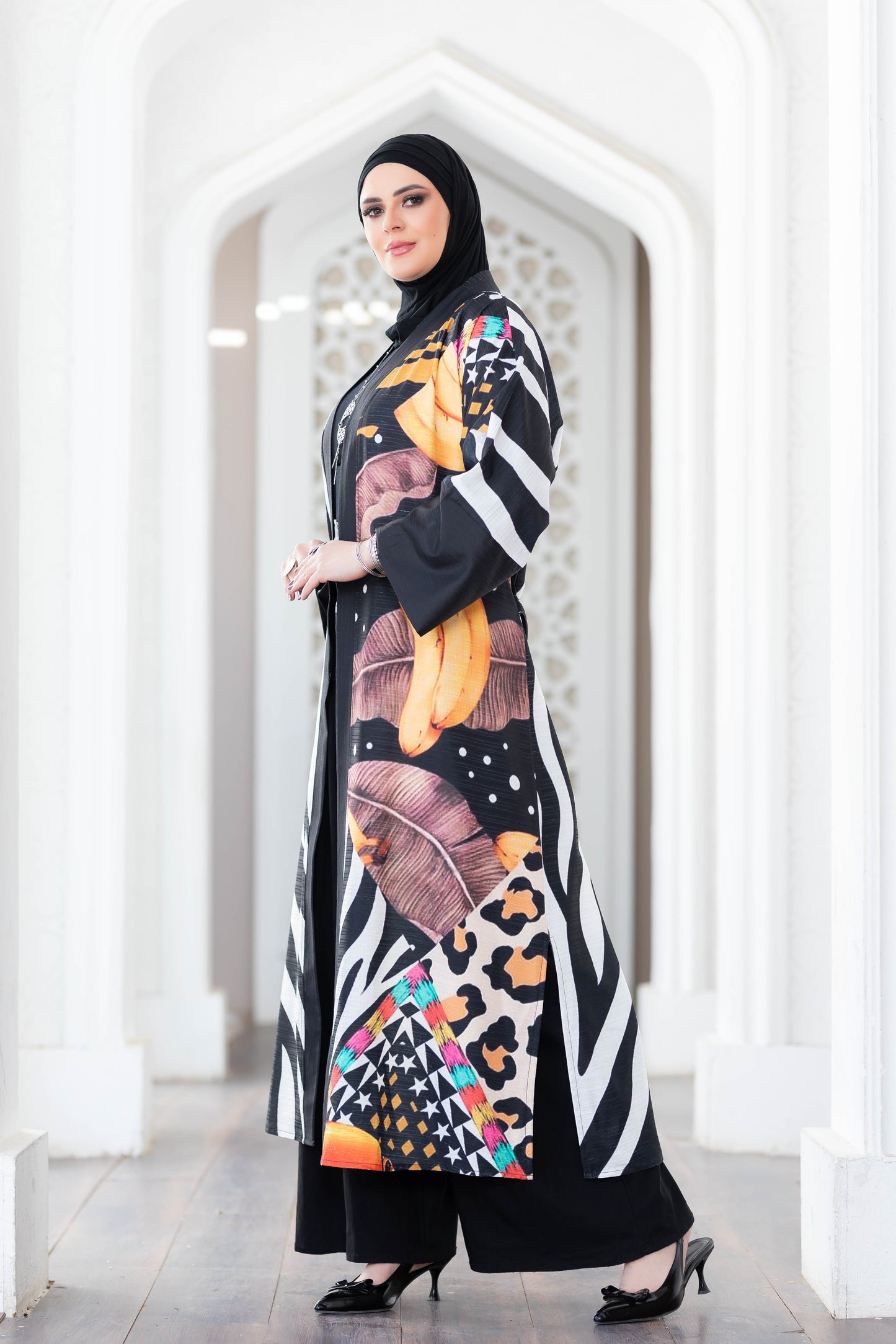 Vibrant digital print kimono with striking zebra pattern and abstract motifs, showcasing stylish contemporary fashion.