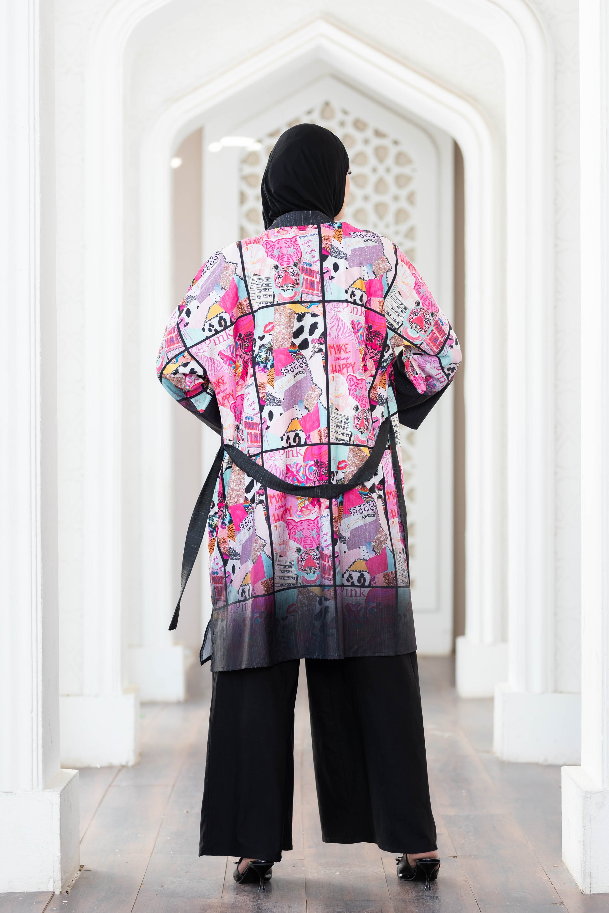 Colorful floral printed short kimono on display in store