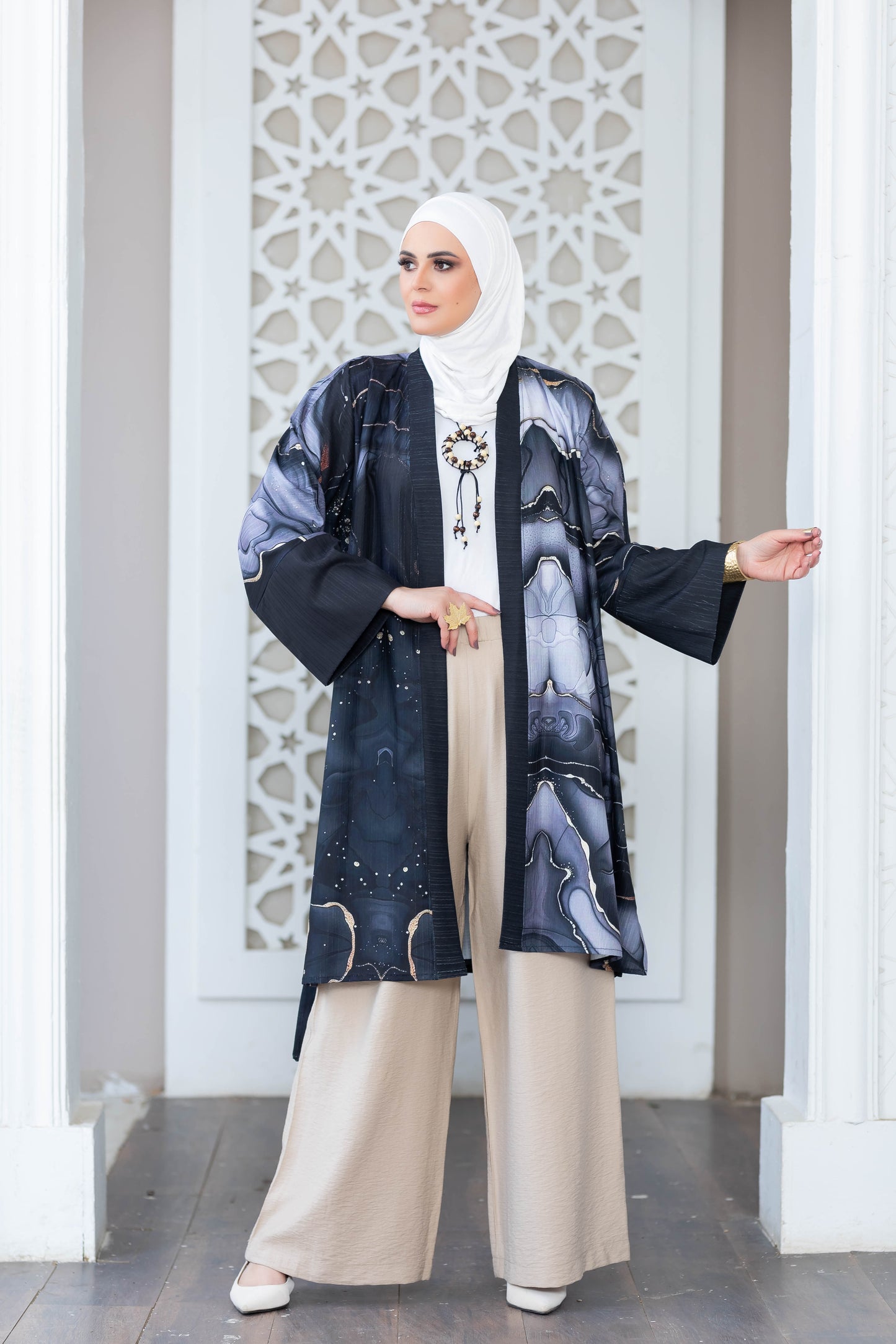 Stylish digital print kimono with elegant floral pattern displayed in satr store