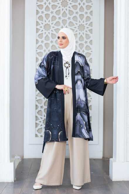 Stylish digital print kimono with elegant floral pattern displayed in satr store