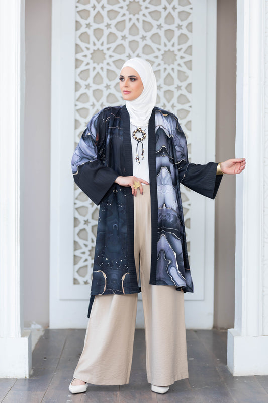 Stylish digital print kimono with elegant floral pattern displayed in satr store