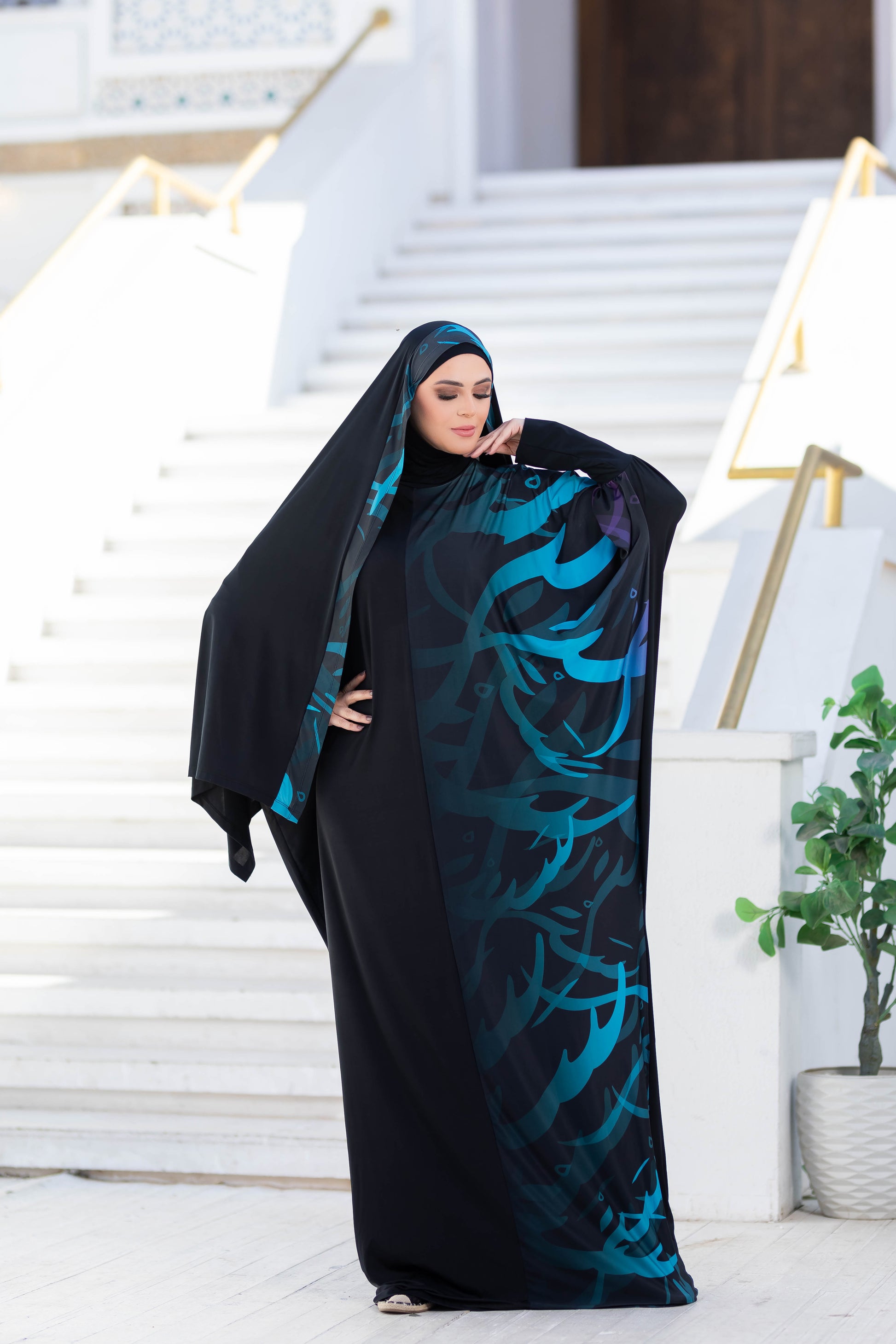Modest Isdal 777177 - Elegant Islamic Women's Abaya with Vibrant Turquoise Pattern