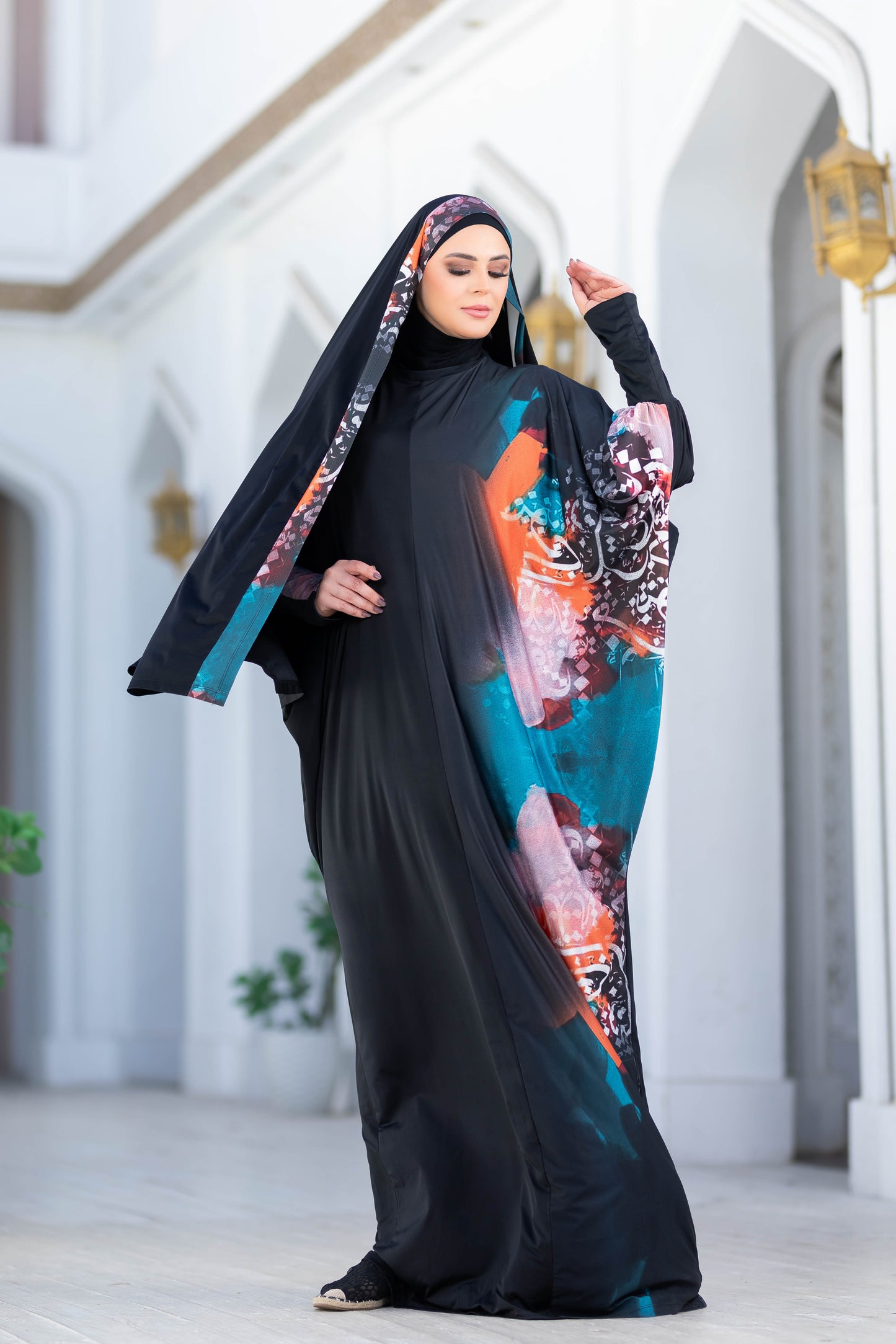 Modest Isdal 777179: Elegant floral abaya with vibrant colors and flowing silhouette, creating a stylish and modest look.