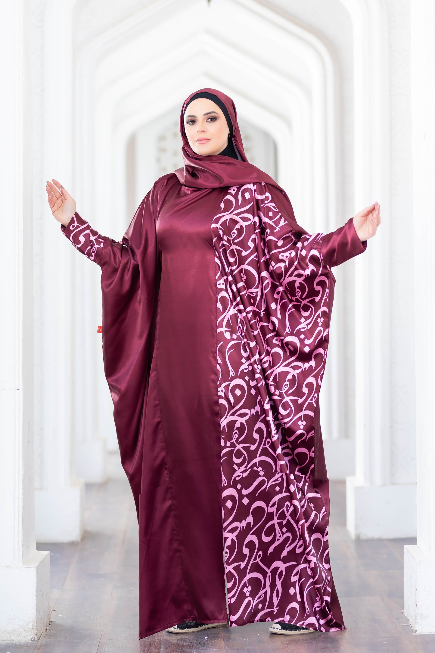 Elegant satin modest dress with intricate floral pattern, available in burgundy color