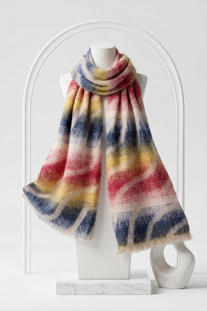 Multicolored striped scarf on a mannequin against a white background