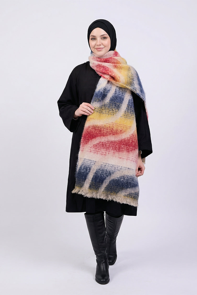 Person wearing a colorful scarf with a black outfit on a white background