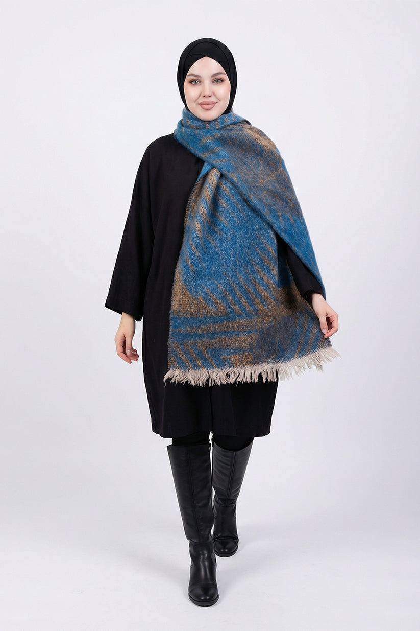 Woman wearing a blue and brown patterned scarf on a white background