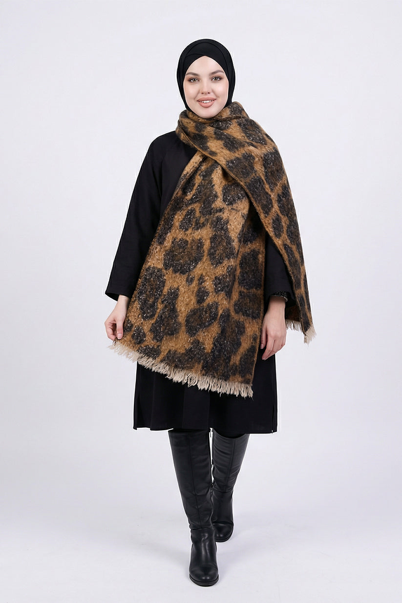 Woman wearing a leopard print scarf on a white background
