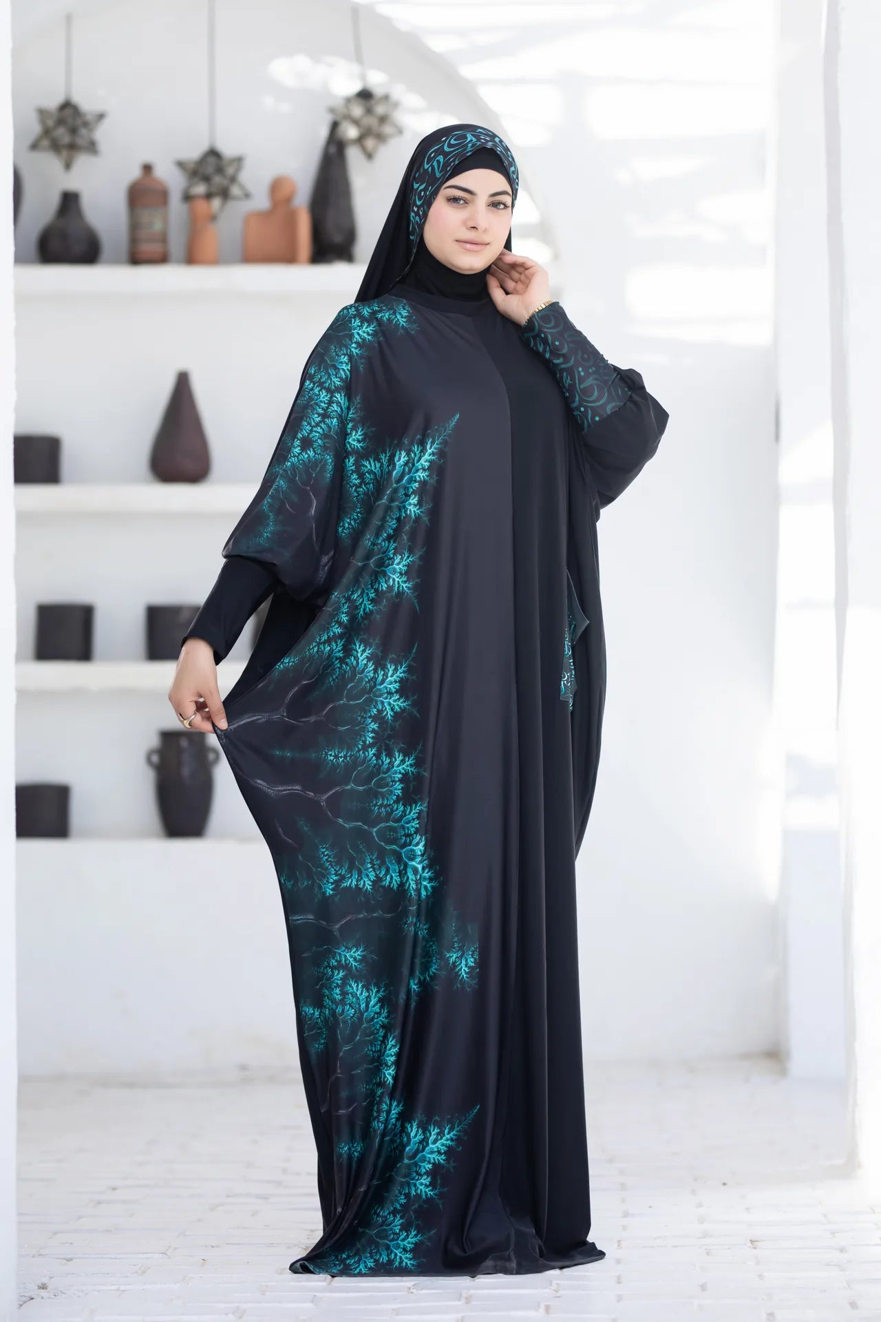 Side view of open flowing isdal highlighting relaxed fit and softness
