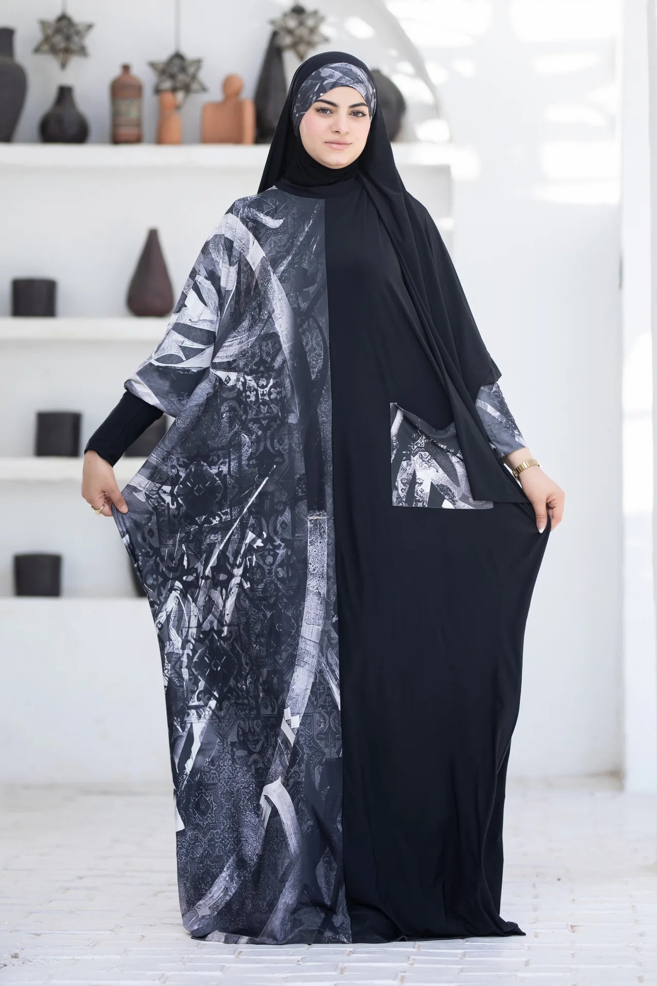 Side view of flowing isdal highlighting relaxed fit and understated style
