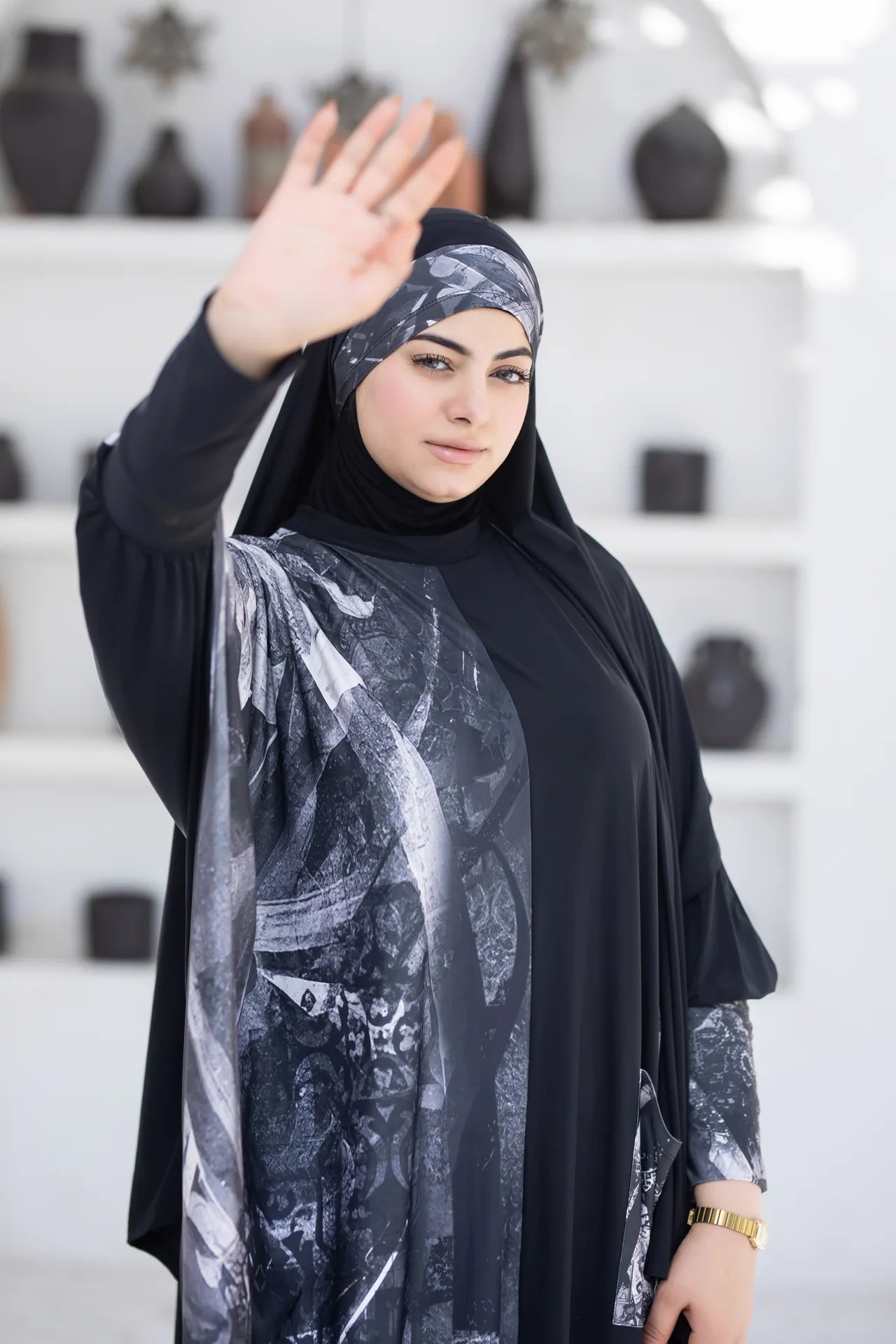 Understated modern design of isdal with flowing cut and balanced elegance
