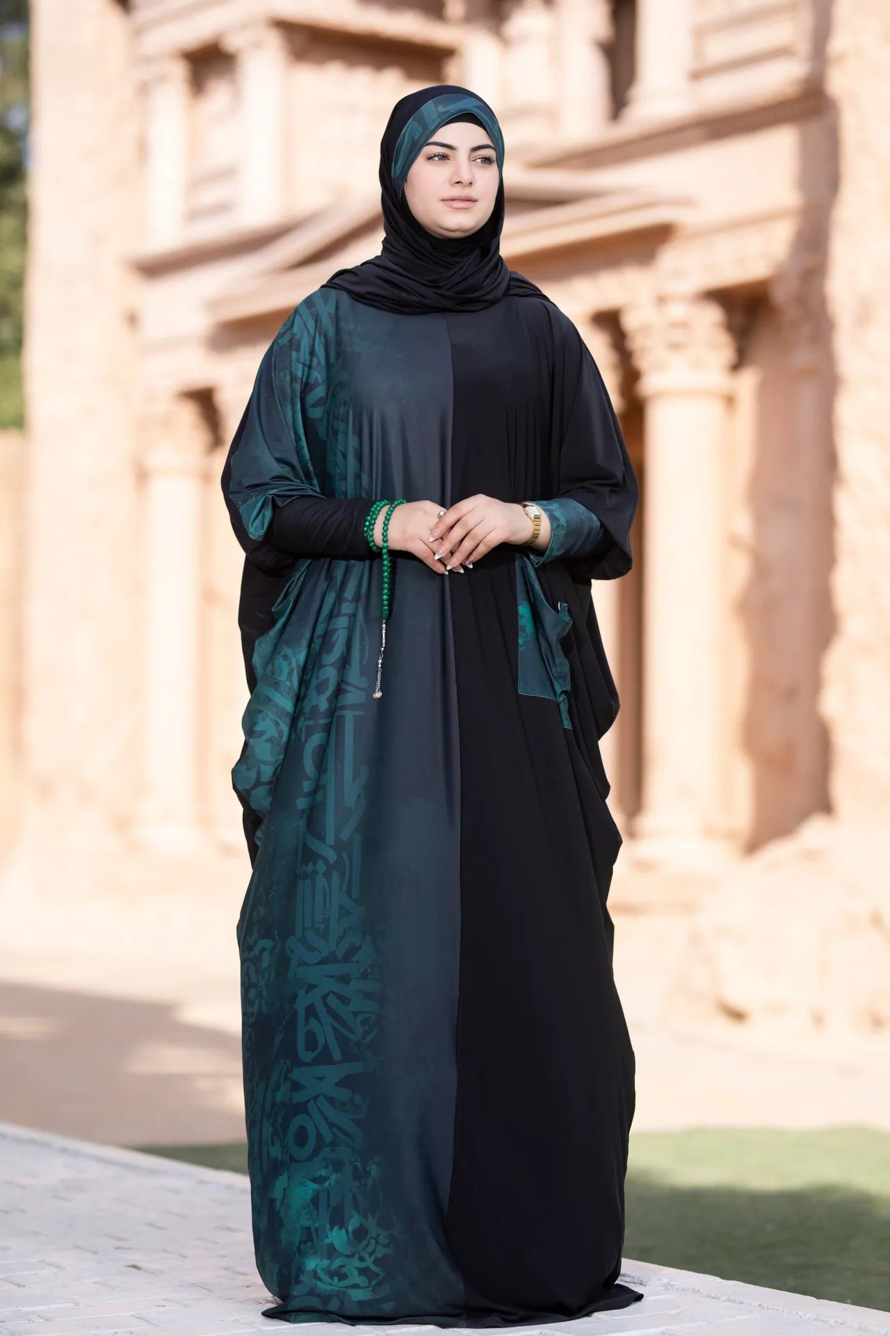 Confident isdal with flowing silhouette and deep toned artistic details
