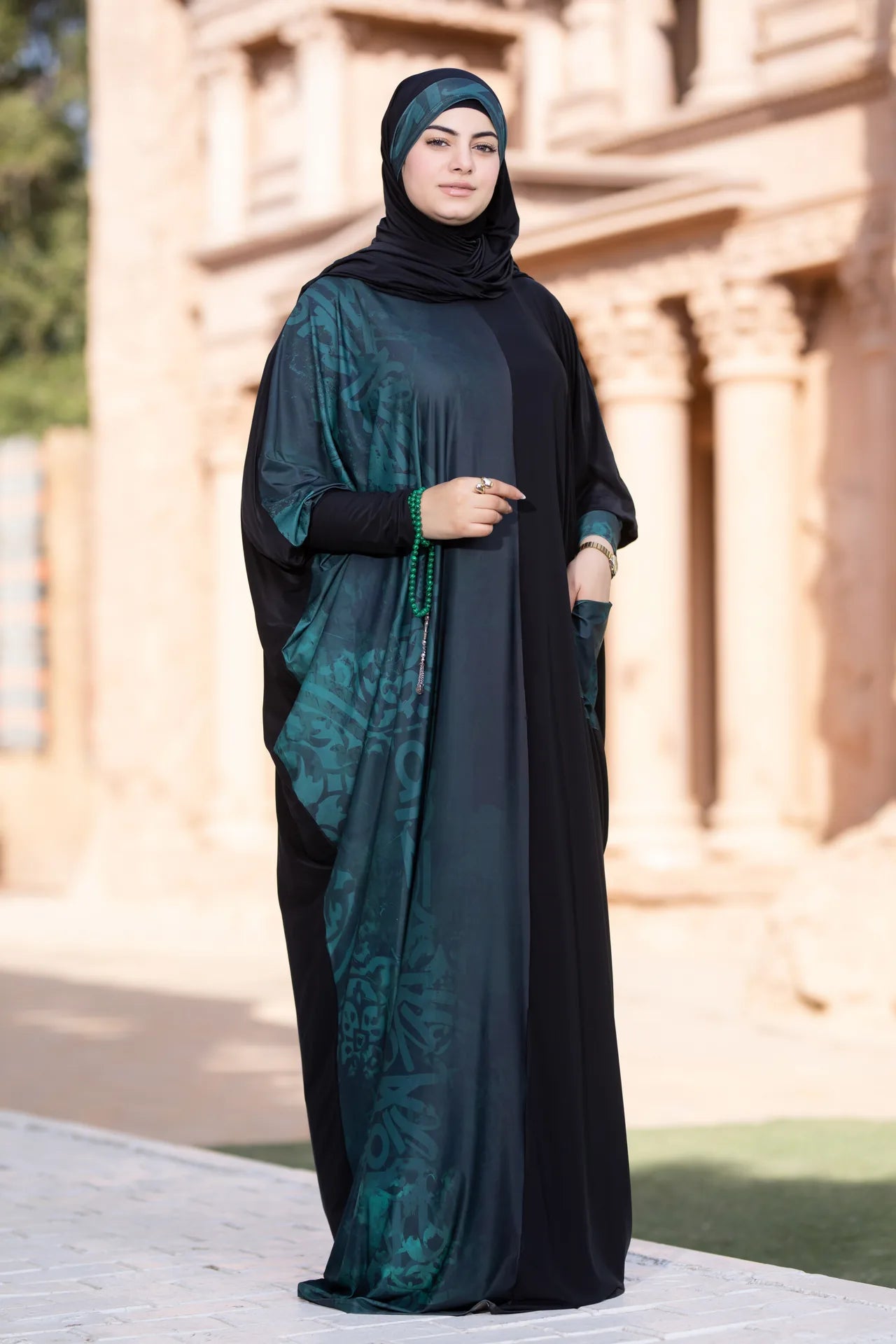 Model wearing confident isdal with strong and serene flowing design
