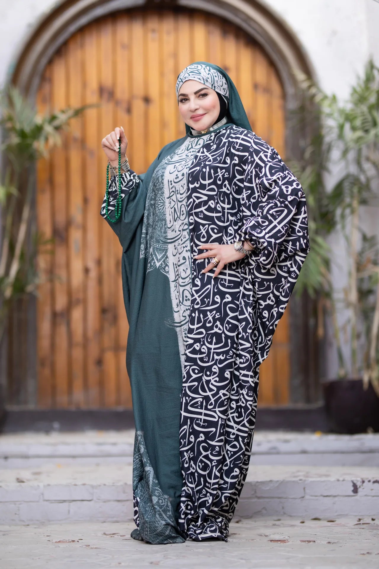 Wajd isdal expressing calm presence through soft fabric and flowing design
