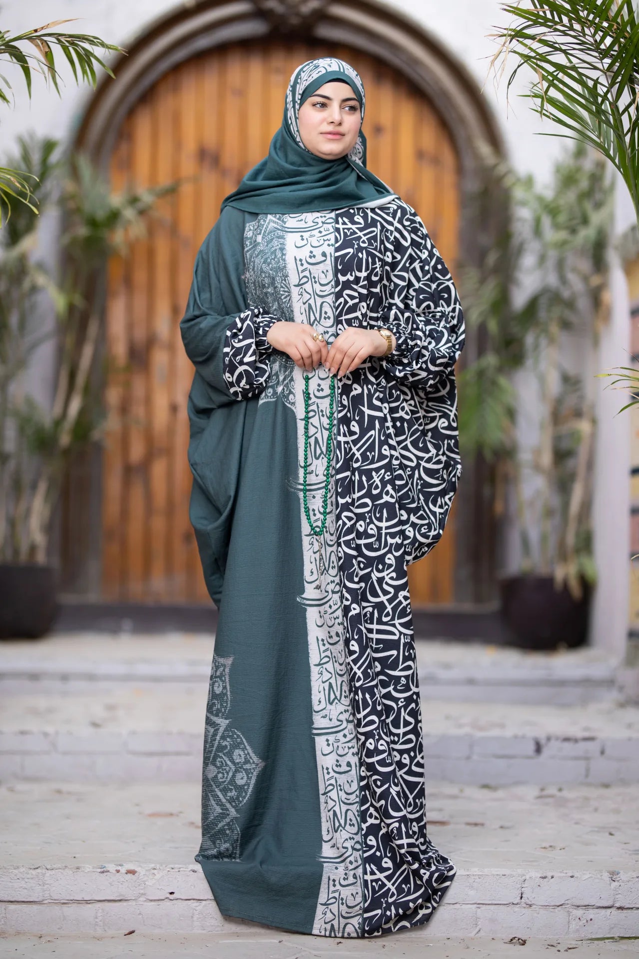 Wajd isdal with flowing silhouette and calligraphy inspired artistic print
