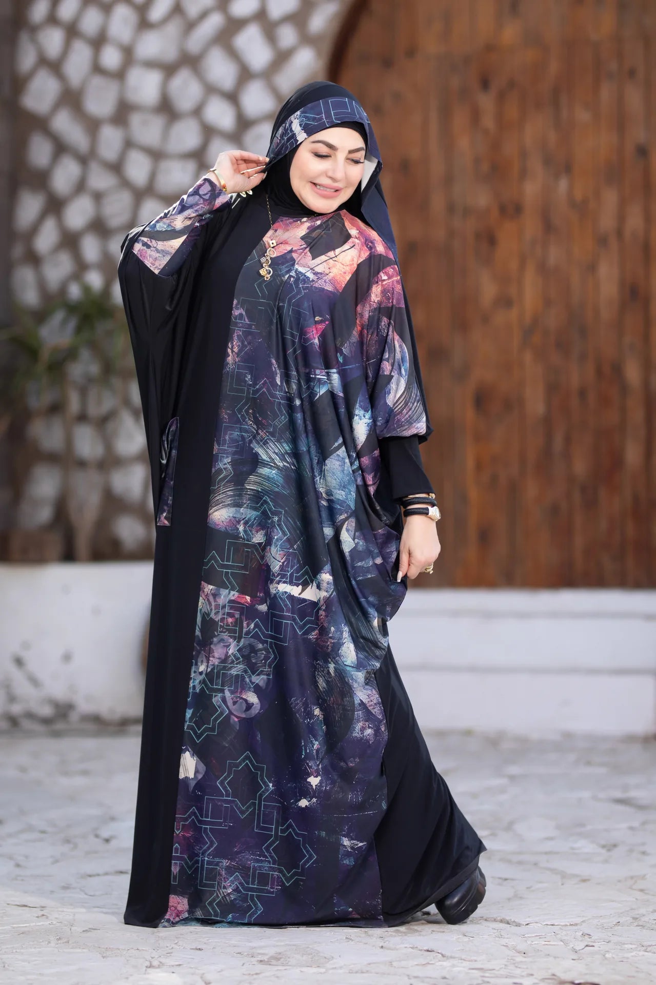 Model wearing modest flowing garment designed for daily wear and prayer
