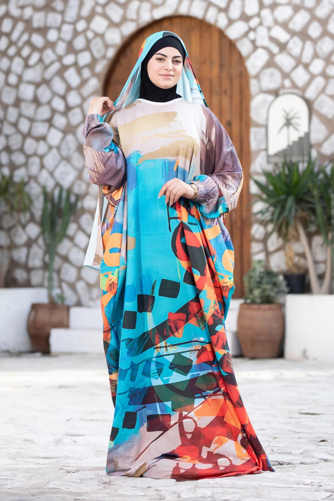 Mawj garment in motion showcasing dynamic flow and rhythmic artistic pattern
