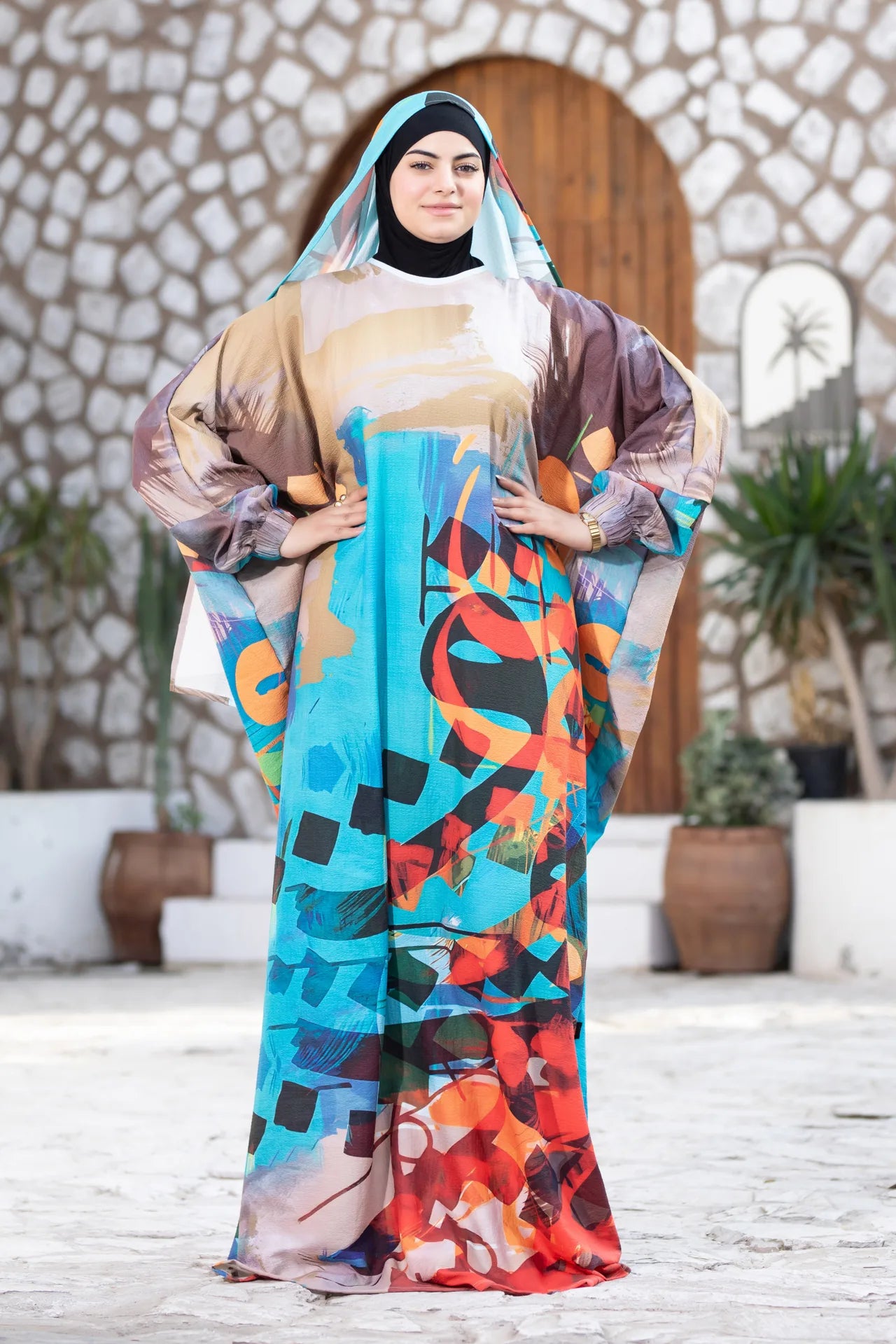 Mawj artistic garment featuring fluid silhouette inspired by movement and rhythm
