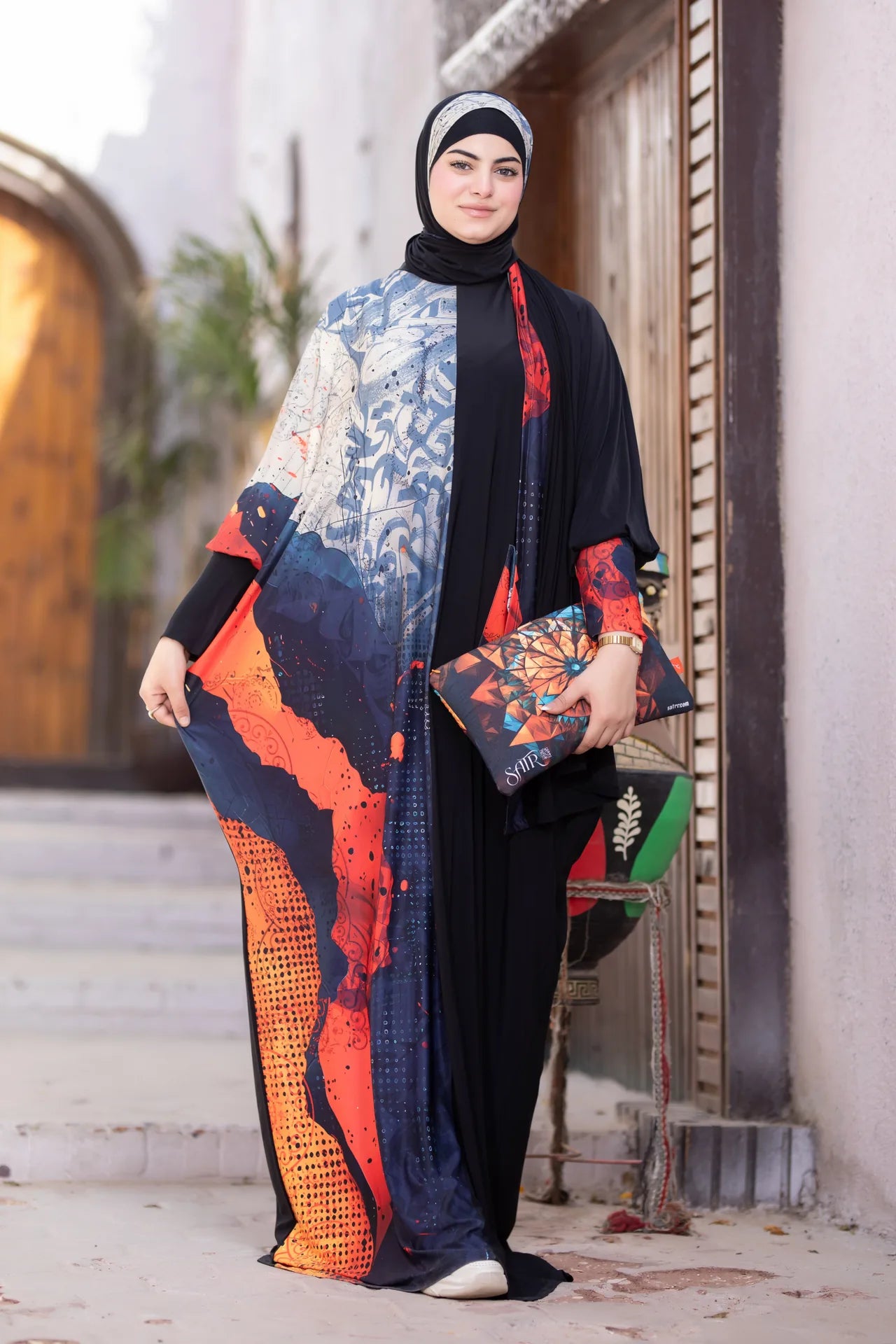 Side view of flowing isdal highlighting modern cut and textured details
