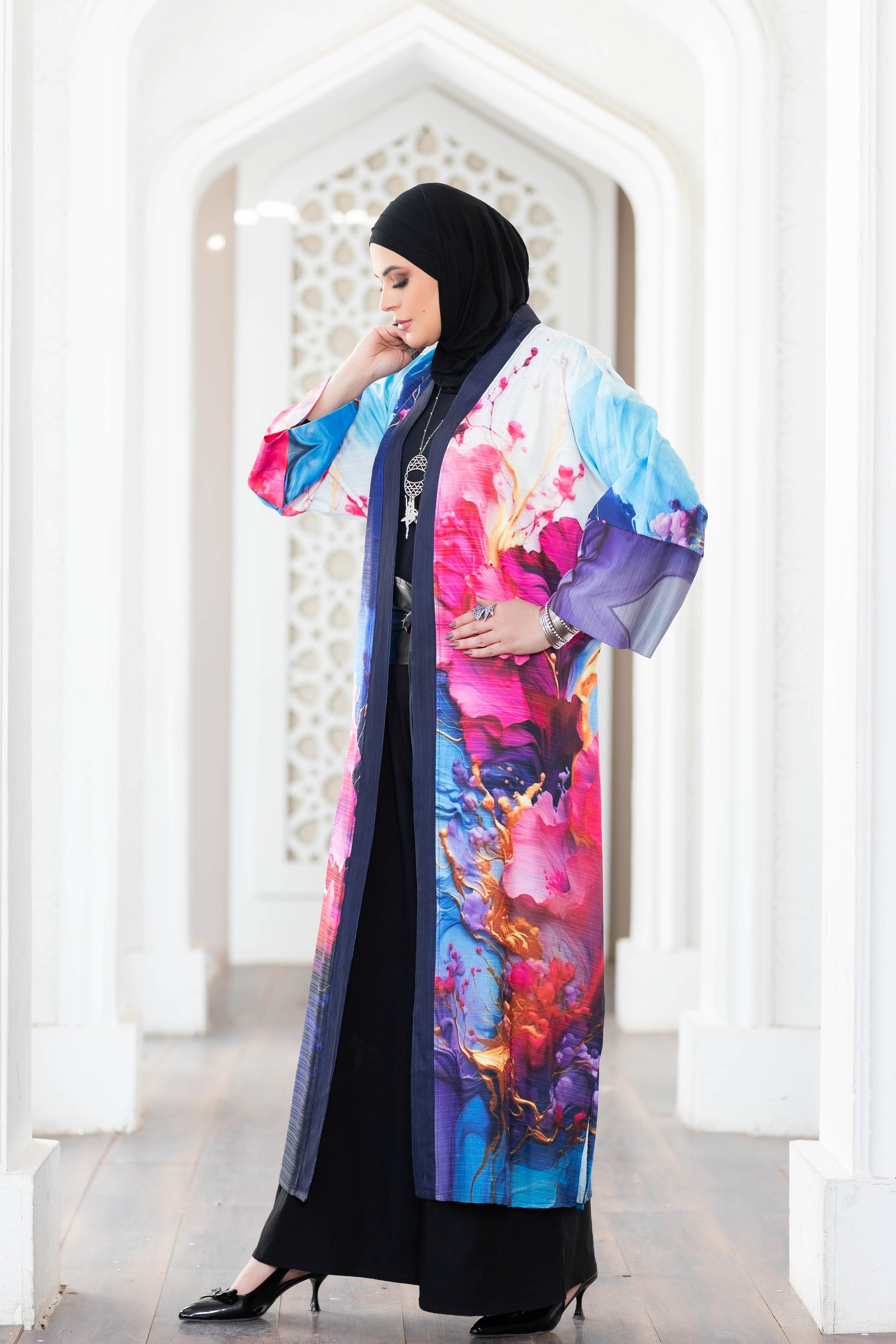 Vibrant floral kimono with elegant Islamic architecture