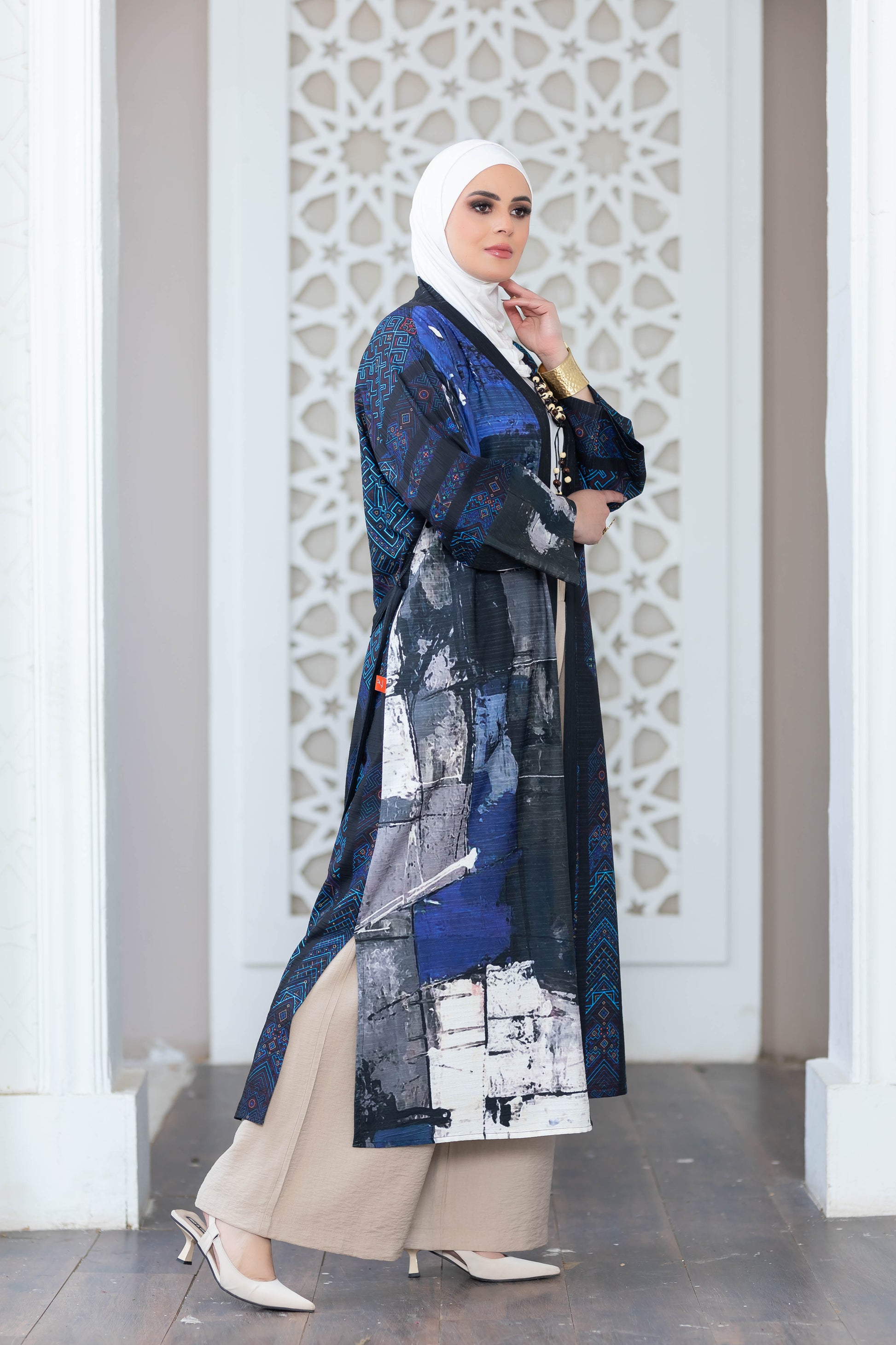 Vibrant digital print kimono from satr with ornate pattern and distinctive design for fashionable modest wear.