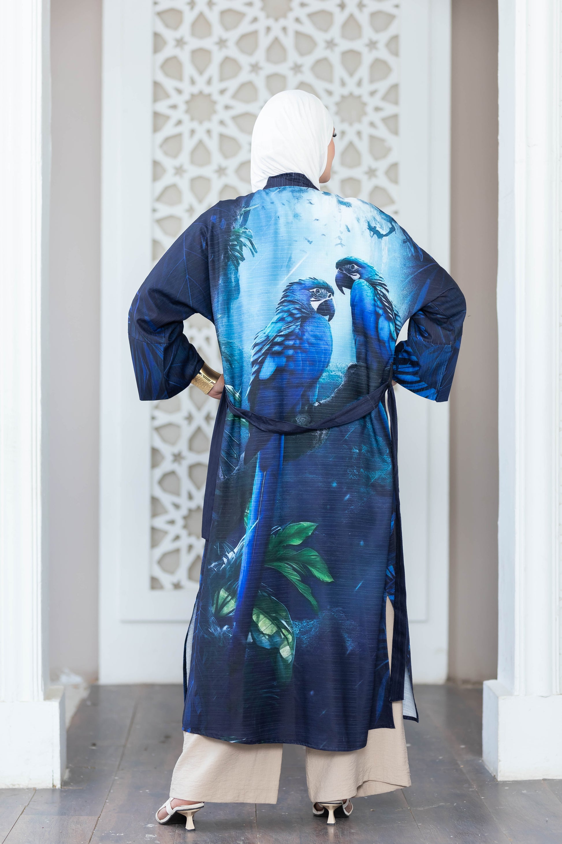 Vibrant digital print kimono with cascading tropical birds and foliage pattern.
