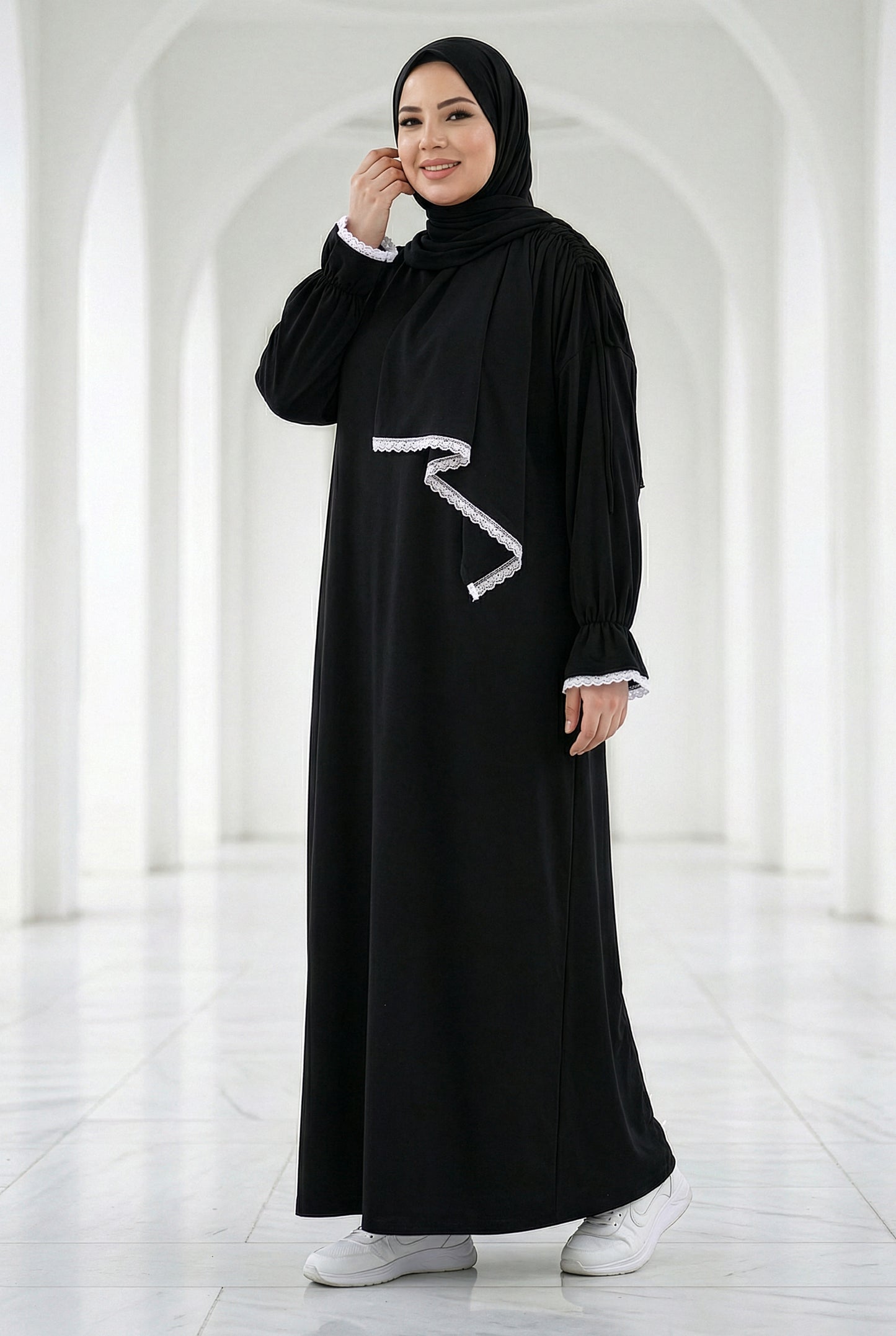 Black Grace Cotton Isdal with embroidered cuffs and modest flowing full-length fit
