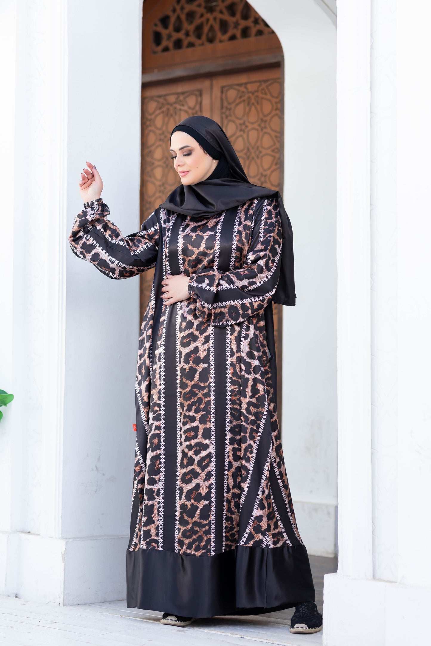 Modest dress 777188 by My Store - Elegant Islamic fashion with intricate leopard print patterns and loose, flowing design.