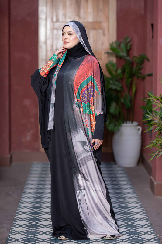 Satr Hejab 77762 ESDAL - Elegant modest fashion accessory with colorful patterned sleeves and flowing black fabric, showcased in a traditional setting.