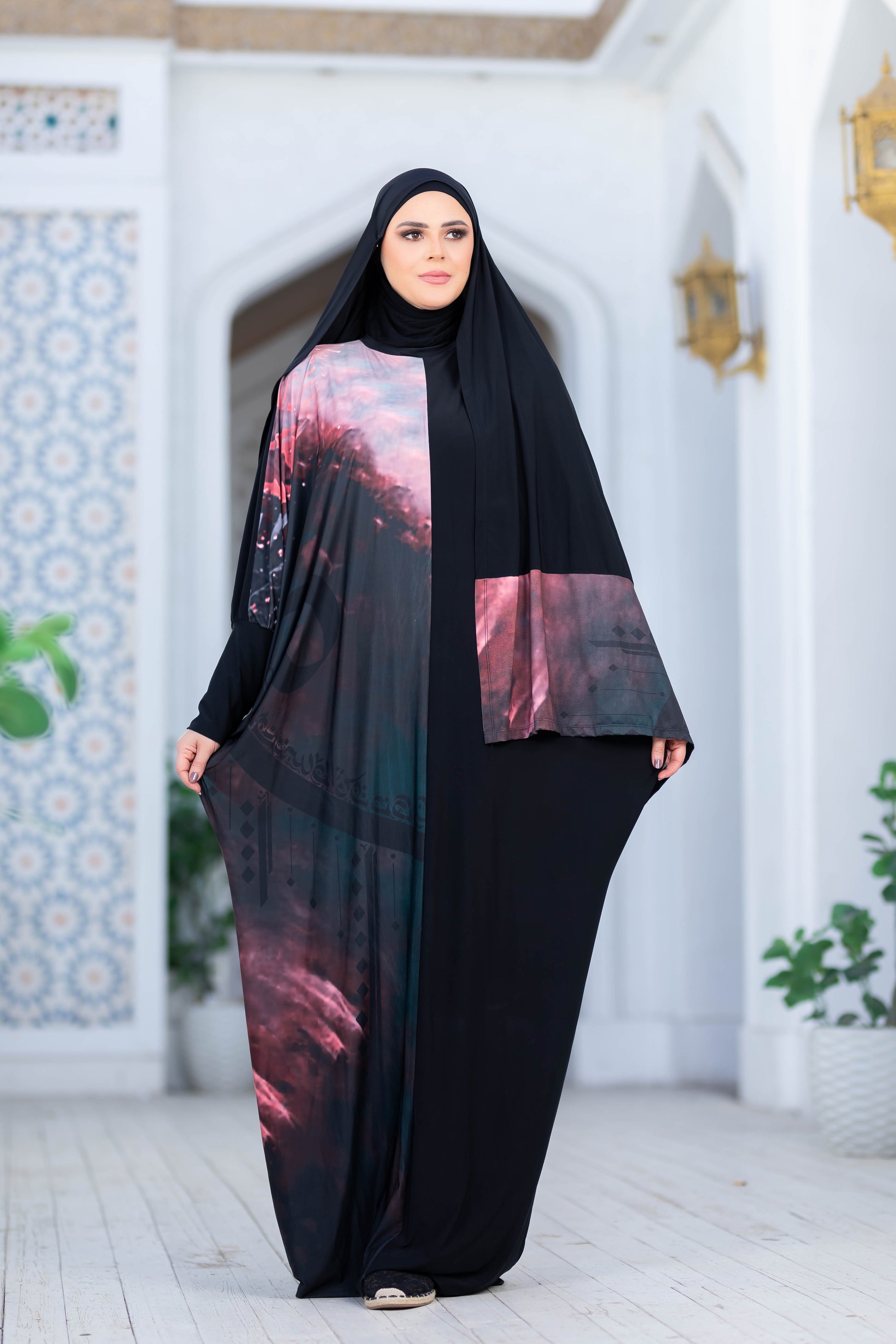 Modest Isdal 777119 - Elegant modest abaya with vibrant floral print design, providing comfort and style for the modern Muslim woman.