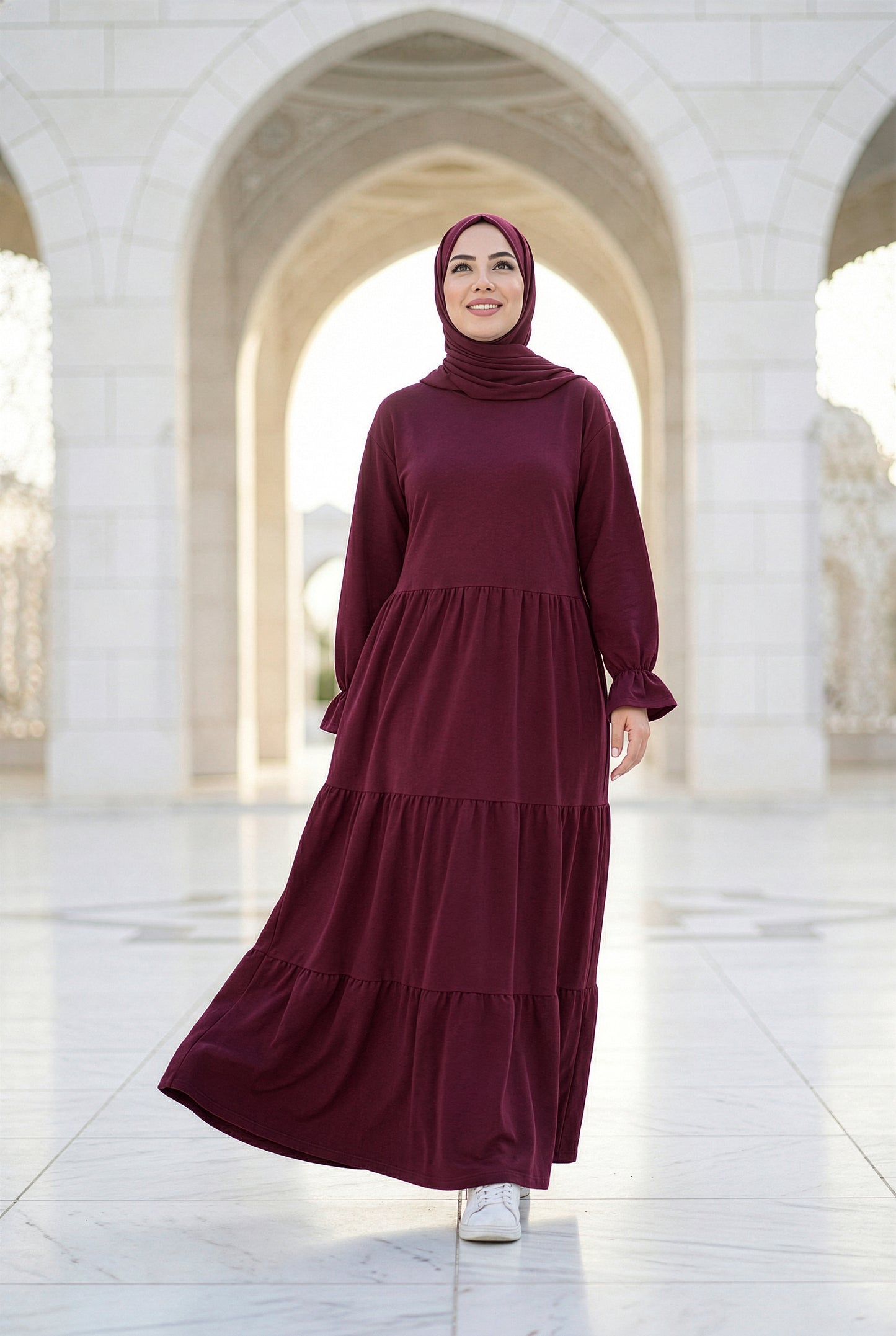 Deep burgundy Soft Flow Isdal with flowing tiered silhouette and modest full-length fit
